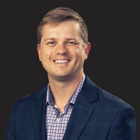 A headshot photograph of Daniel Buchenberger.