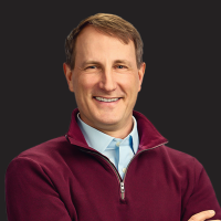 A headshot photograph of Chris Van Denburg.